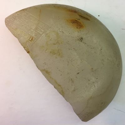 Fragment of bowl, fake inscription. Bowl fragment with mirrored inscription forgery. Alabster.; YPM BC 004173