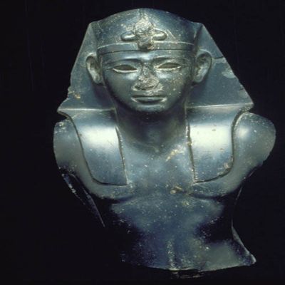 Bust of Ptolemaic king. Polished black diorite. Head and torso, no arms, `nemes' headdress, uraeus serpent at brow. Ptolemaic Period ca. 220-180BC. H:44.5cm (17 1/2'); W: 24.2cm; D:16.2cm. YAG 1.1.1953. Egypt; YPM ANT 256941