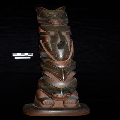Totem pole, wood carved with polychrome (red and black). Depicts two bears, one bird and one whale. The dorsal fin on the whale has been restored. Length: 30 1/2 in. Port Simpson, B.C., North Pacific Coast; YPM ANT 248463