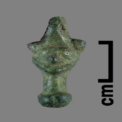 <bdi class="metadata-value">Amulet(?). Head with suspension loop and pestle like base. Bronze.; YPM BC 031156</bdi>