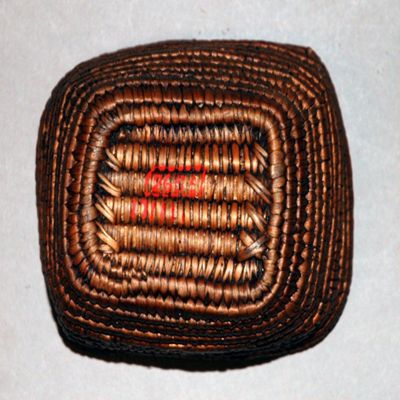 Coiled berrying basket with imbricated ornament. Vancouver, B.C. Lilooet Tribe, Salish.; YPM ANT 017111