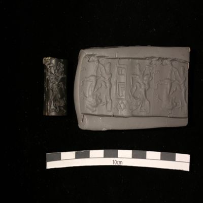 Cylinder seal. Hero/lion contest, hero/buffalo contest; inscription. Akkadian. Serpentine.; YPM BC 036994