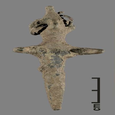 Figurine. Anthropomorphic figure with conical hat, two earrings, arms spread, lower body ending like a peg. Bronze.; YPM BC 031124