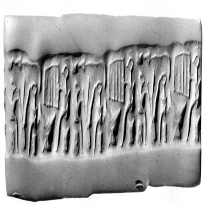 Cylinder seal. Two figures drinking out of vessel, seated figure holding lyre?. 3rd mil, Early Bronze Age. Serpentine.; YPM BC 029870