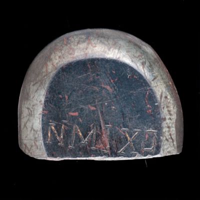 Amulet. Ob. Reaper (lower half); Rev: schion. Hematite.; YPM BC 038188