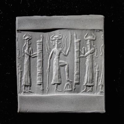 Cylinder Seal. The sun god Shamash, facing right, wearing a striped dress, with rays rising from his shoulders, raises his saw-toothed knife in his left hand, holds a lowered mace in his right hand and places his left foot on a mountain. He stands between two gates which are held by two gods who are facing right and each wearing a horned headdress. Akkadian. Serpentine.; YPM BC 037969