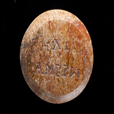 Amulet. Ob: Abubis with snake and palm frond on head. Rev: e-limbro-. Yellow Jasper.; YPM BC 038604