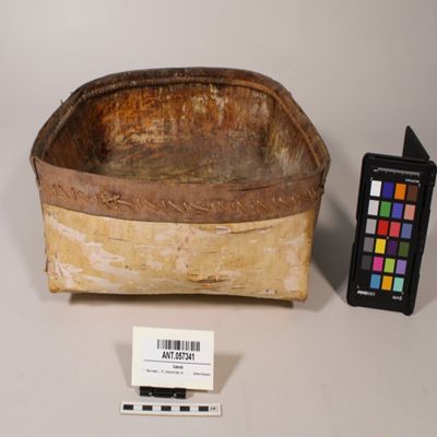 <bdi class="metadata-value">1 Bark basket, L. 14', white birch bark, rim and end decorated with inner bark, sewn with spruce roots, moose hide hanger attached, cost 1, Fort Nelson, BC, Slave, N Athapaskan; YPM ANT 057341</bdi>