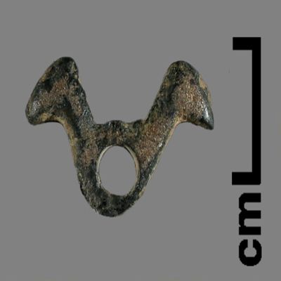Figurine. Two heads of birds with joined bodies in loop shape. Bronze.; YPM BC 031284