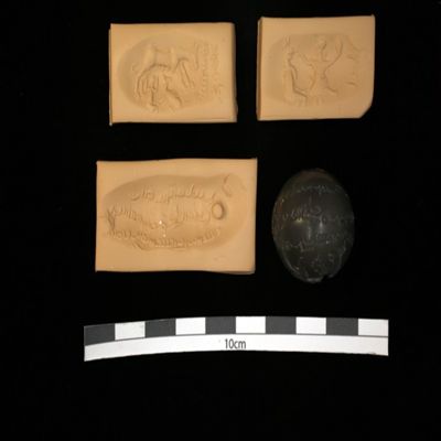 <bdi class="metadata-value">Bead seal. Man in tunic and leggings fighting monster; horse hybrid suckling small animal, figure; inscription. Sasanian. Banded agate.; YPM BC 037519</bdi>