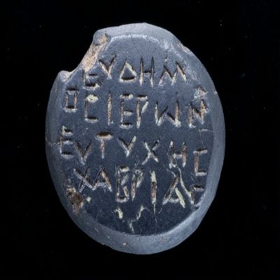 Amulet. Ob. Symbols, Iao, Abraelth Dios (similar to #48). Rev: (names) Eudemos, Hieron,Eutyches, Chabrias. Black stone.; YPM BC 038610