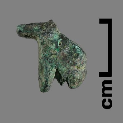 Figurine. Lion, body pierced with hole, flat peg below tail. Bronze.; YPM BC 031183