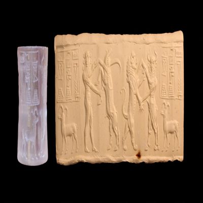 Cylinder seal. Frontal hero contesting with buffalo; bullman fighting lion; inscription above goat. Akkadian. Rock crystal.; YPM BC 036992