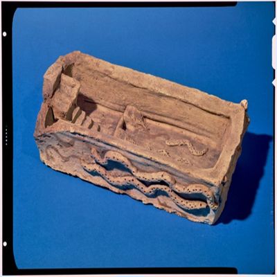 Architectural model. Basin with snakes in applique. Rectangular temple model, double entwined snakes on outside of three sides. Inside, snakes slither up ramps toward alter with four steps. Rolls of clay connect the three ramps. Thick walls are bevelled at top. Old Babylonian?. Clay.; YPM BC 016863