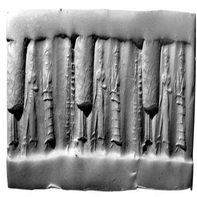 Cylinder seal. Goddess with two raised hand, long flounced dress and horned headdress, god in ascending pose with long skirt parted over knee, and holding weapon facing figure almost lost; inscription. Old Babylonian. Hematite.; YPM BC 029880