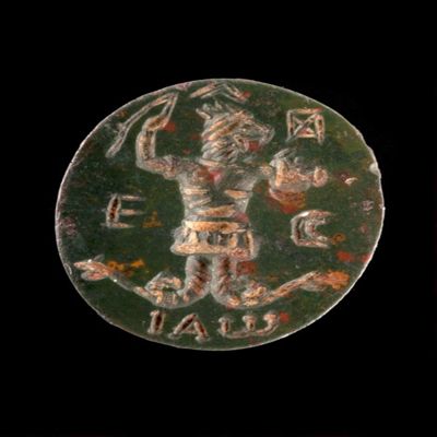 Amulet. Ob. Anguipede with iao and epsilon sigma. Rev. four symbols and iao. Number of lines: 5. Stone.; YPM BC 038171
