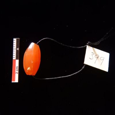 One Iranian carnelian etched faceted ellipsoid bead, likely B.C.; YPM ANT 330434
