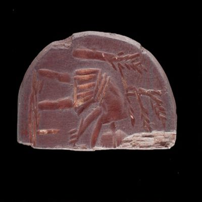 Amulet. Ob. Reaper (left half). Rev: schion. Number of lines: three. Hematite.; YPM BC 038189