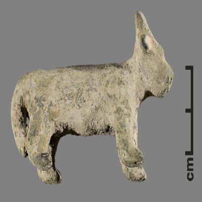 Figurine. Horner bovine with tail wagging to the right. Bronze.; YPM BC 031139