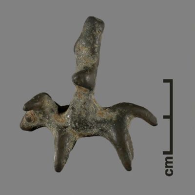 Figurine. Ox mounted by goddess(?) with truncated headdress. Bronze.; YPM BC 031102