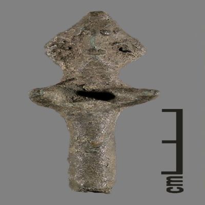 Figurine. Anthropomorphic figure with small conical hat, arms spread, lower body ending like a peg. Bronze.; YPM BC 031123