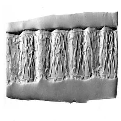 Cylinder seal. Two kilted figures with high headdresses and long hair wrestling, reversed pair of rampant lions over a kneeling antelope, one line band below and above. 2nd mill, Syrian. Hematite.; YPM BC 029862