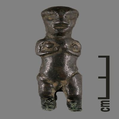 Female figurine. Female figurine; hands clasped below breasts; long hair. Copper/Bronze. metal drawer; YPM BC 023991