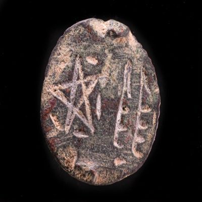 Amulet. Black stone.; YPM BC 038634
