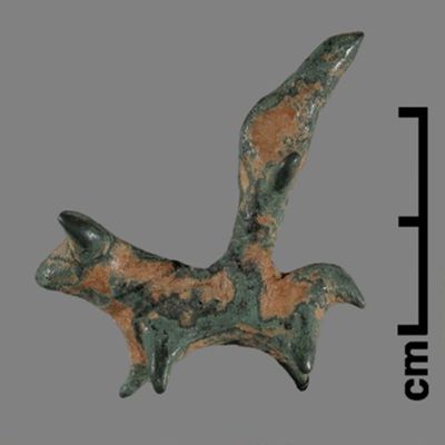 Figurine. Ox mounted by rider with conical hat and spread arms. Bronze.; YPM BC 031149