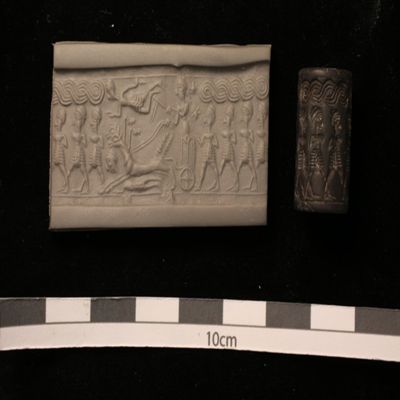 Cylinder seal. Two-horse chariot with acrobats above and below, driver, four marching men; stars and guilloche in field; linear borders. Mitannian. Hematite.; YPM BC 011925