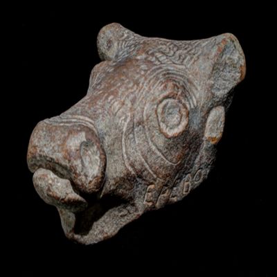 Figurine, mold made. Bull s head. 'Erebos' written on the left side.; YPM BC 038115